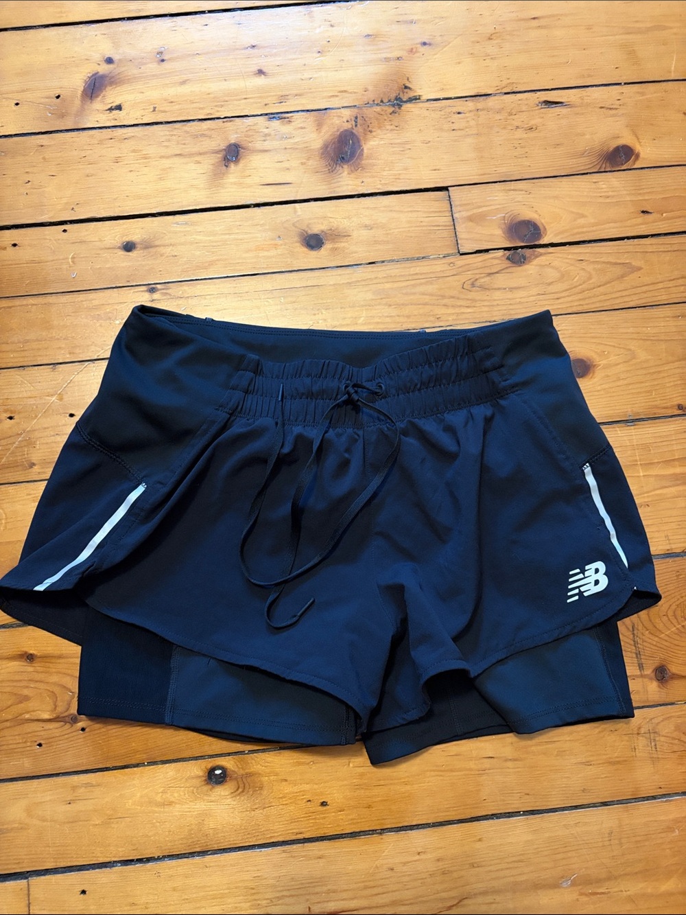 New Balance Women's Black Athletic Running Shorts with Reflective Trim